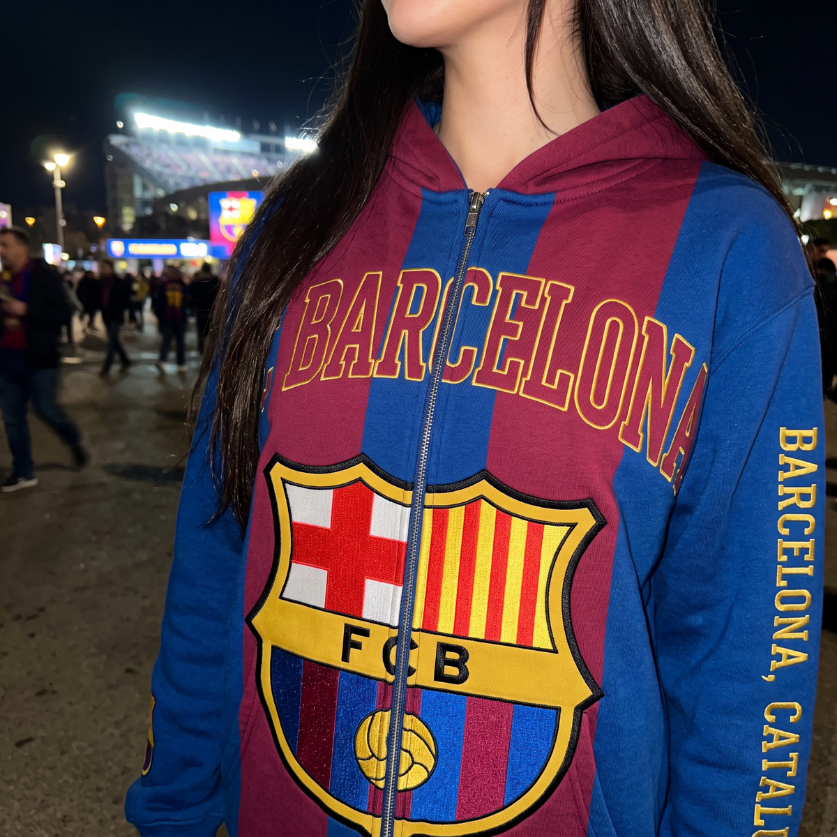 Close-up of the FC Barcelona MatchWorn hoodie fabric, crest and sleeve print